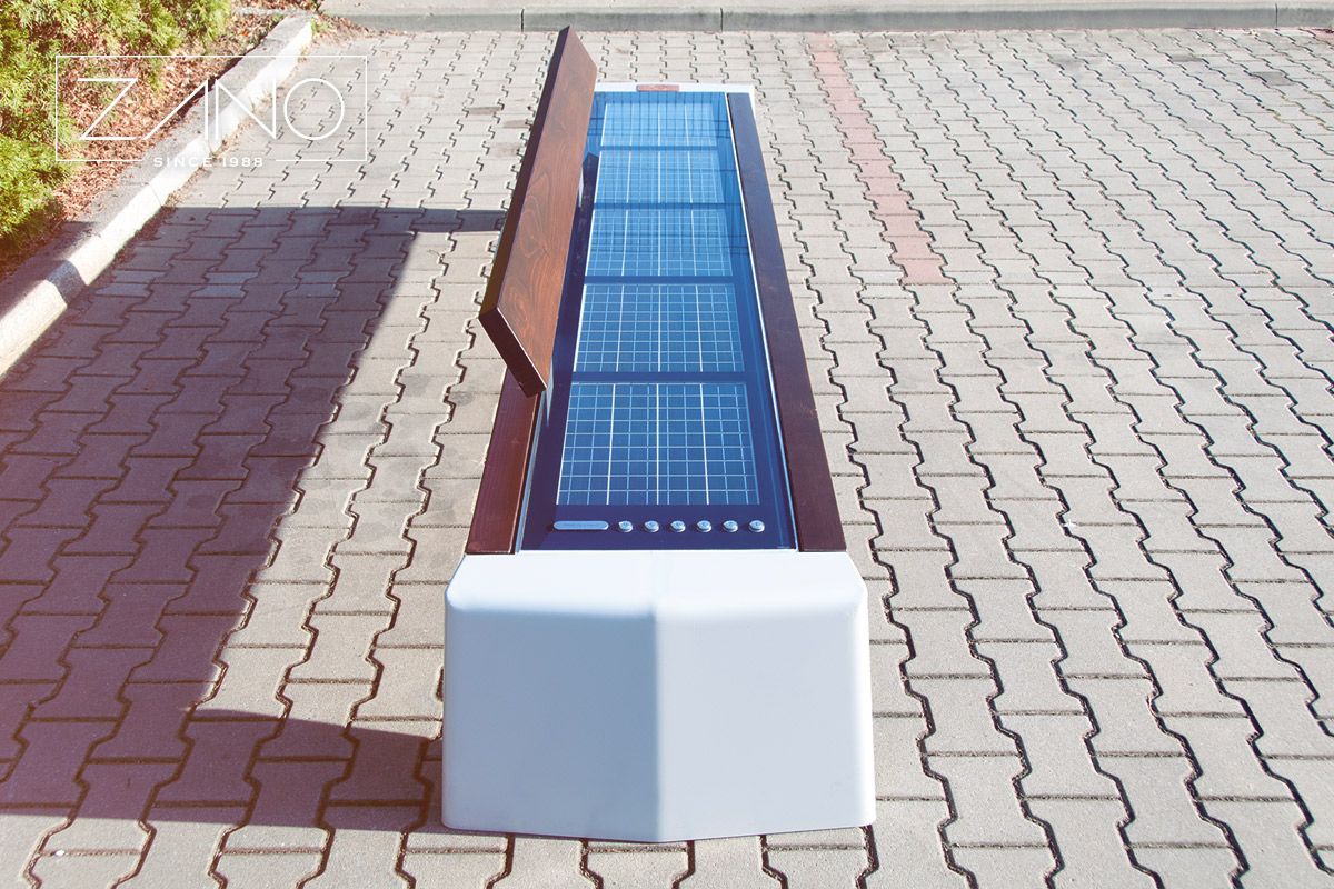 Public bench powered by photovoltaic panels made of carbon steel painted RAL 9006 color and spruce wood (color walnut)