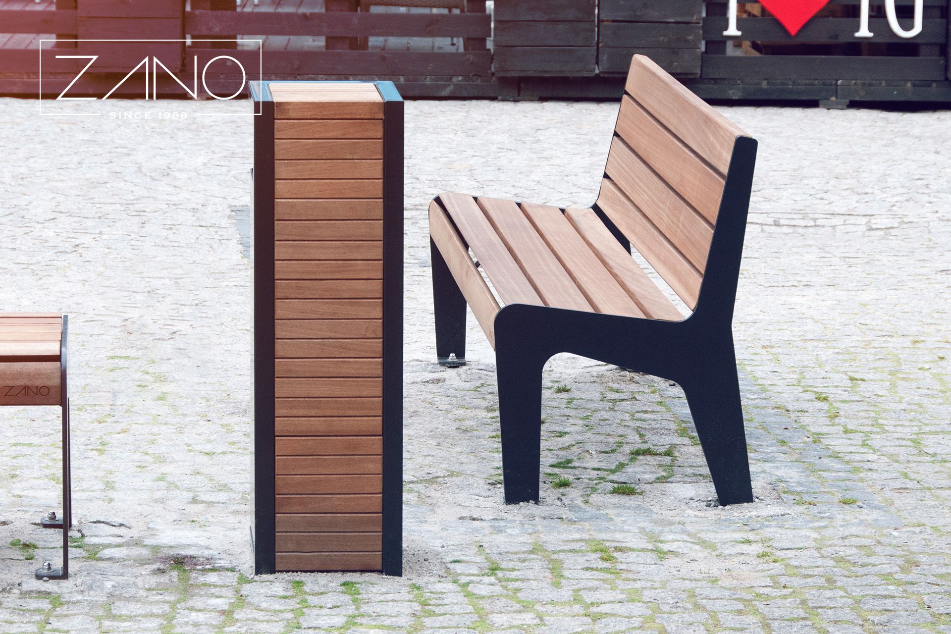 Street bench made of carbon steel and hardwood sapeli