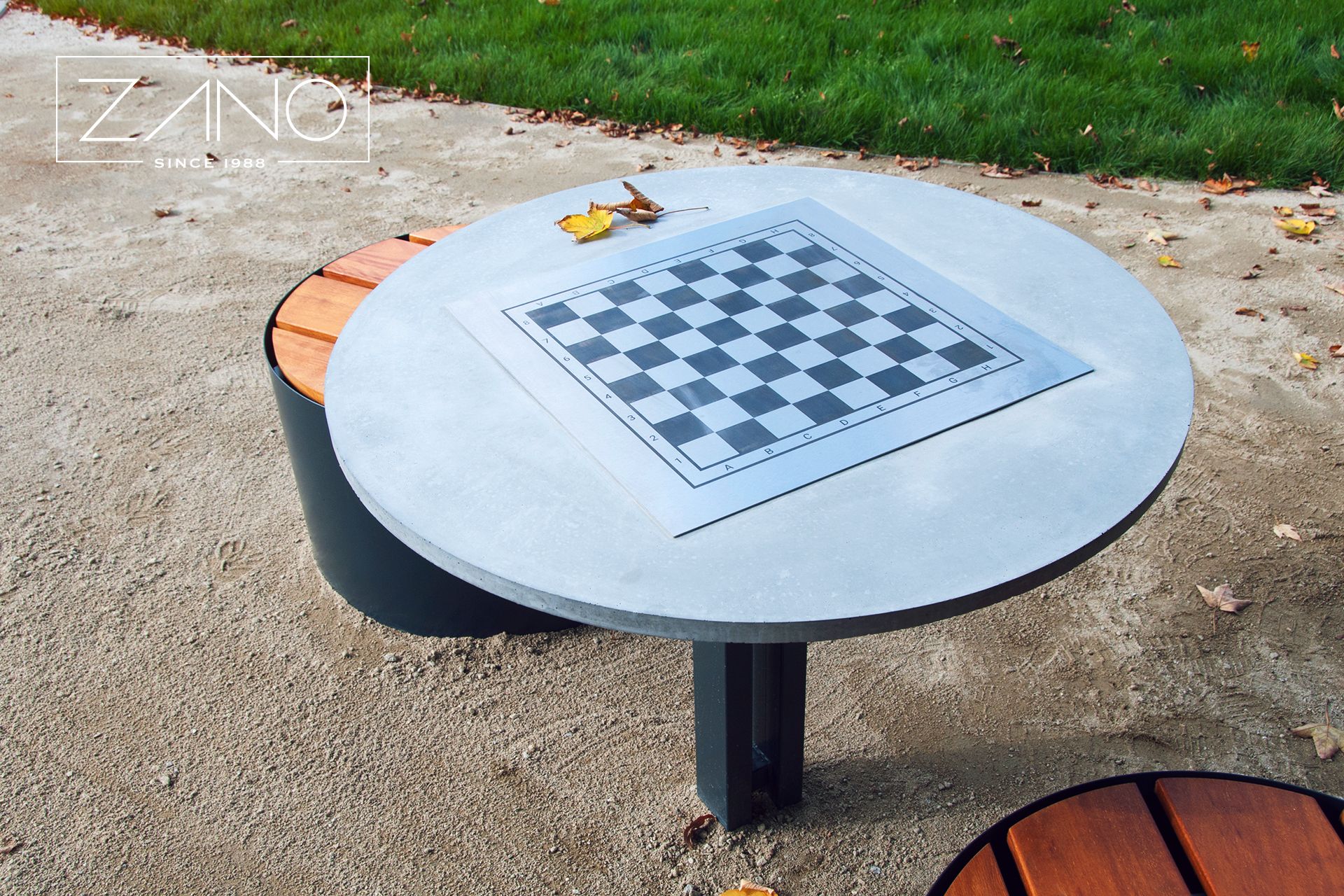 Concrete table with stainless steel chessboard